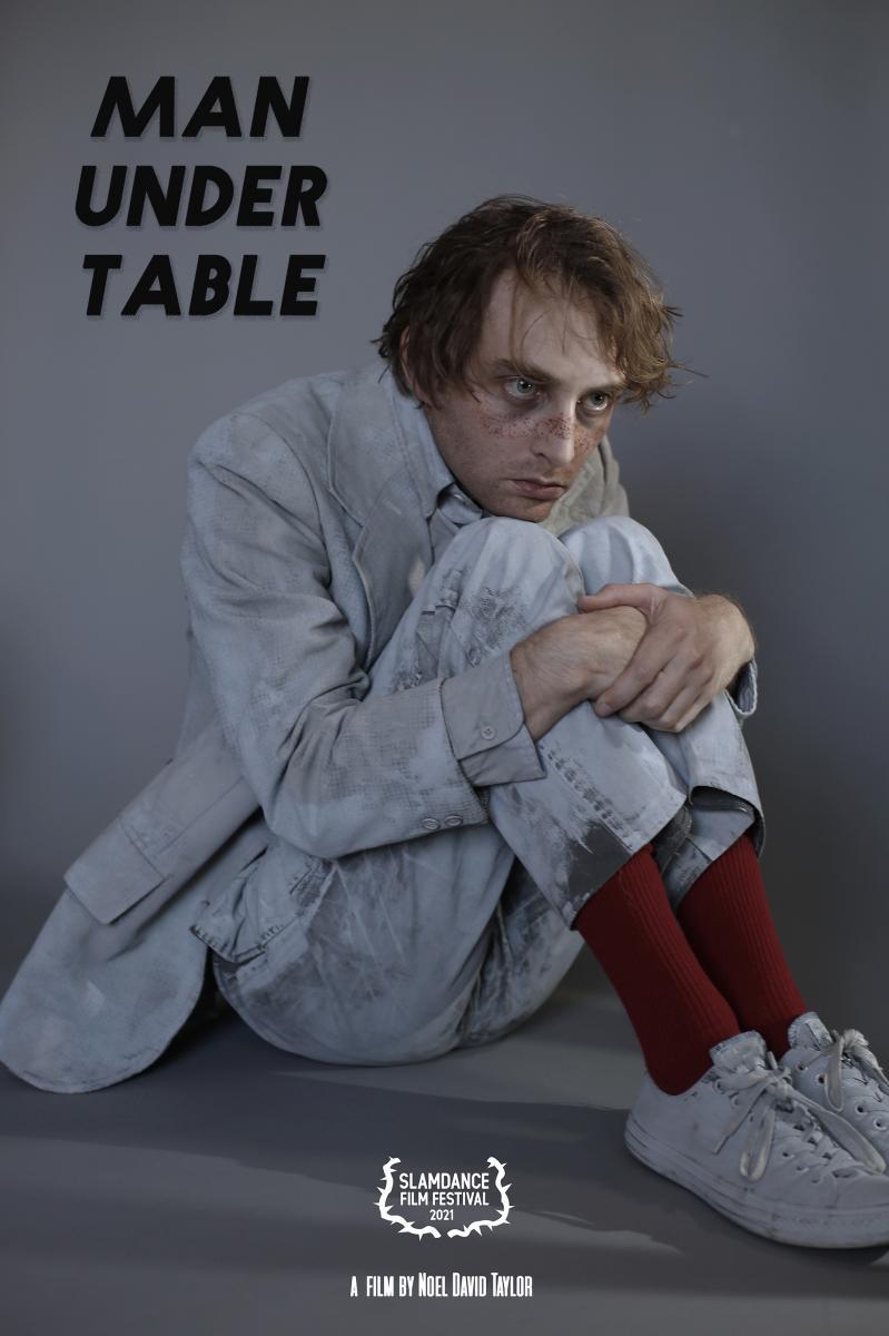 Man Under Table